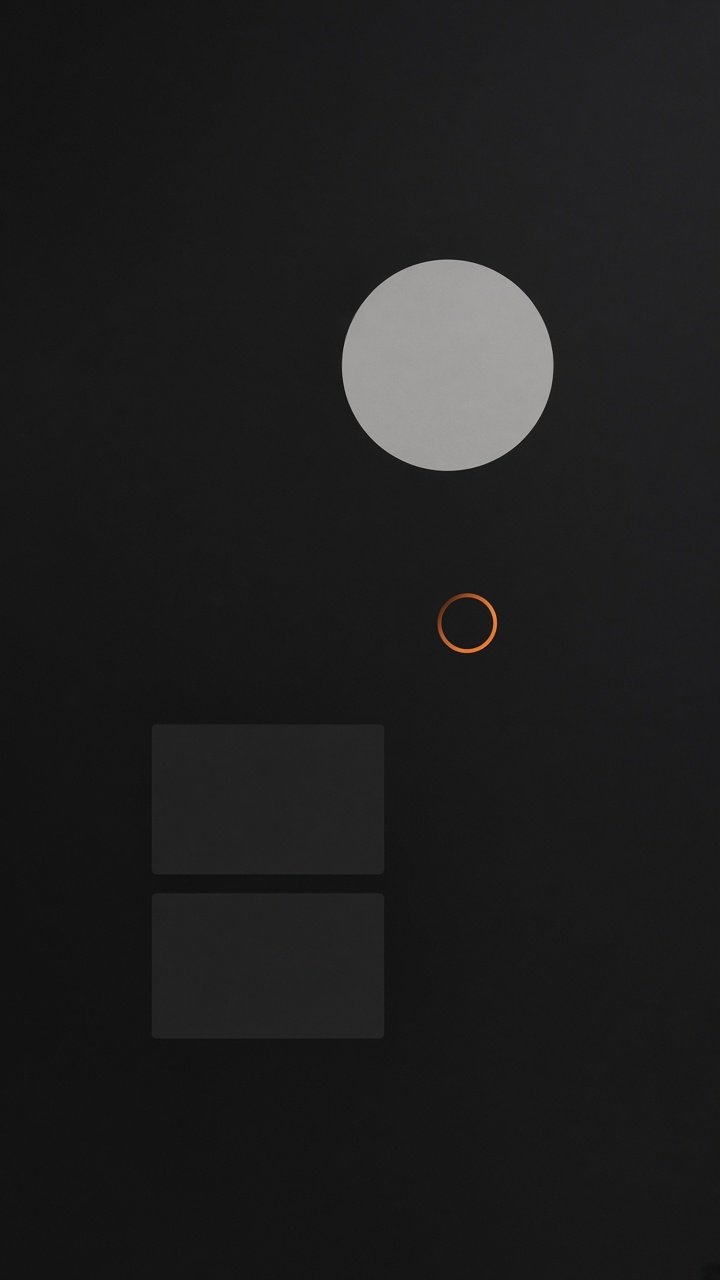 Abstract dark screen with a pale circle and an orange ring